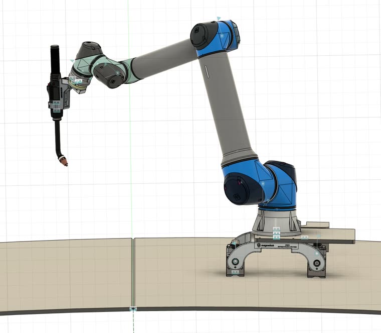 Konstruktionsmodell: Roboter mit Schweißbrenner auf der schaltbaren Magnetbasis